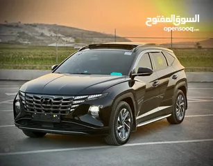  6 هونداي توسان/2022 فل الفل فتحة سقف بانوراما  2x4 ///240Hp بنزين + كهرباء  ( Haybrid) 1600cc