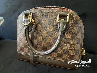  7 LV Louis Vuitton Alma BB handbag small