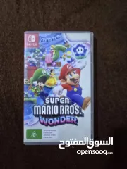  15 نينتندو سويتش مع 5 العاب super mario party و super mario wonder و super mario 3d world و ايد وكنترول