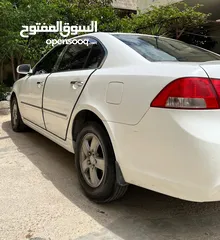  13 كيا اوبتما لوتسي 2009 لون ابيض بحالة جيدة جدا