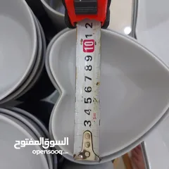  7 طقم صحون وزبادي وكاسات