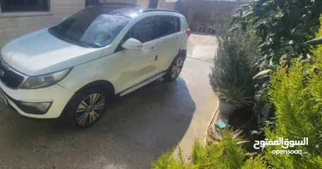  1 كيا سبورتاج متور 2000 4×4 فل اضافات مع فتحه بنوراما للبيع