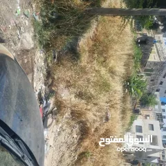  5 ارض.2250 م2 كوشان طابو مطله وكاشفه على شارع رئيسي تصلح لكافة الانشطه