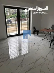  2 شقة أرضية فاخرة للبيع في الجندويل  - مقابل أسواق السلام 130م مع ترس 30م لم تسكن