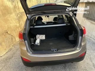  13 2009 ‏Hyundai توسان LX20 اربع ابواب، اللون فيراني، الكراسي جلد والسيارة 92,000 كيلو فقط وبحالة رائعة