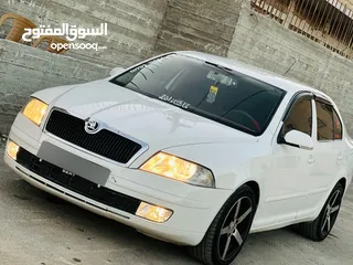  2 سكودا نيو 2006 دهان جديد  فحص ممتاز وتخلو من القص والضربات هيئه جديد فرش جلد  شاشه اندرو