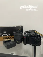 3 كاميرا نيكون D3000. 18-55VR