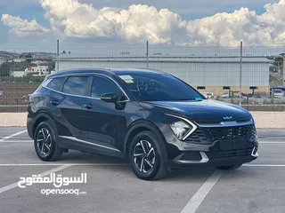  9 كايا سبورتاج /2022 فل بدون فتحة سقف  2x4 ///240Hp بنزين + كهرباء  ( Haybrid) 1600cc