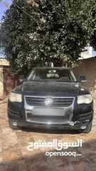 1 فولكس فاجن طوارق 2008 بحاله ممتازه وسعر مغري