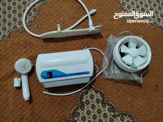  1 قيزر اتمور الأصلي شبه جديد مروحه شفط بتركب على الزجاج شطافه نوعيه اصليه