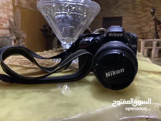  13 كاميرا Nikon 3200