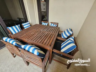 1 Ikea Outdoor table with 8 chairs, very limited usage, almost brand new, 1300AED.