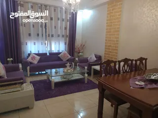  1 طقم كنب +طاولة سفرة خشب ثمانية مقاعد