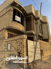  11 ببيت للبيع في حي بغداد ركن طابقين سعر 260 وبيه مجال