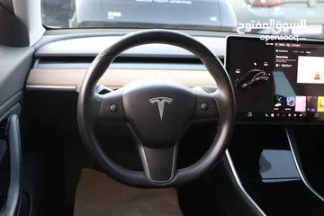  14 Tesla model 3 mid range 2018