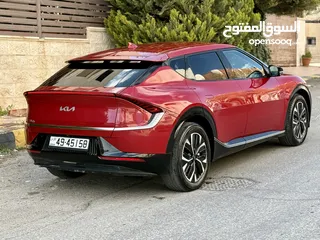  10 كيا EV 6 2022 فل وجمرك جديد ماشيه 30 الف بسعر مغري كاش واقساط بدفعه 3000 دينار