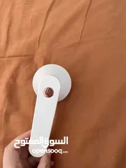  1 جهاز ازاله الصوف من الملابس إلكتروني