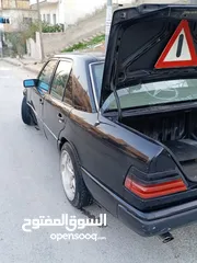  1 مرسيدس E200 موديل 1989 لون اسود