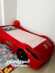  7 تخت اطفال على شكل سيارة