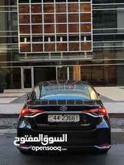  6 تويوتا كورولا هايبرد فحص كامل وارد المركزية وصيانة المركزية لون اسود مميز بحالة جيدة جدا كوشوك جديد