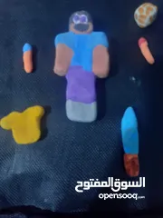  1 شخصيات ماين كرافت درع و سيف و شخصية و 2زينة 2بلوكات كهف