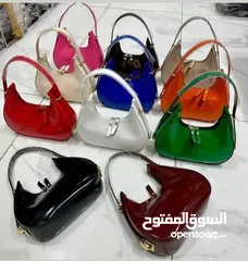  16 شنتة ستاتي اصلي مع العلبة  جلد طبيعي جودة عالية جدا  سحاب ويد طويلة  مقاس 21×27