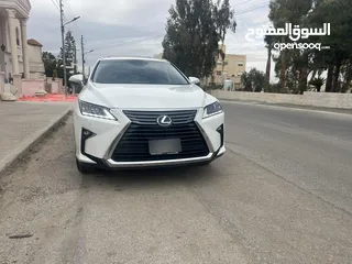  1 لكزس RX450hL موديل 2018 لون ابيض لؤلؤي وارد وصيانه الوكاله اعلى تصنيف من فئتها