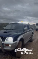  11 متسوبيشي ماقنومL200 2001