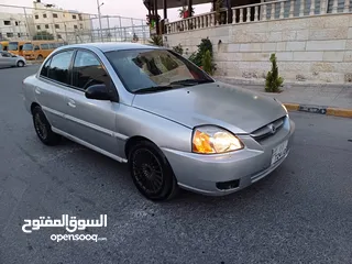  1 كيا ريو موديل 2003 جيرو اوتوماتيك