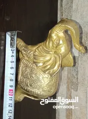 10 فيل نحاس منقوش