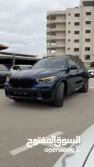  3 BMW X5 ترخيص 2022 ص   محرك 3000 هايبرد plug in/يقطع على الشحنه 80 كيلو متر  399 حصان