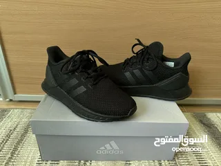  2 Adidas black shoes