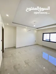  23 شقة طابق اخير مع روف 230 متر وتراس 100 متر على شارعين  طريق المطار خلف المدارس العالمية بسعر مميز