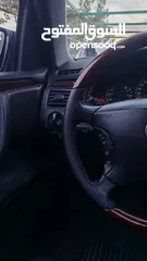  18 E200. 2002  قرش ونص 2002  رقم الهاتف بالوصف