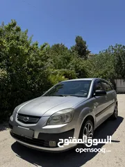  1 كيا برايد 2007 متور 1600 بنزين حساسات خلفيه تحكم ستيرنج تدفئة كراسي فحص نظيف