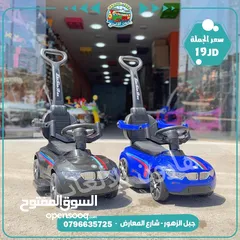  4 ‏سيارة دفع يد او قدم  مع حماي و موسيقى و اناره تناسب عمر 1 سنة الي 4 سنوات من المستورد مباشره