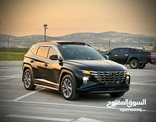  3 هونداي توسان/2022 فل الفل فتحة سقف بانوراما  2x4 ///240Hp بنزين + كهرباء  ( Haybrid) 1600cc