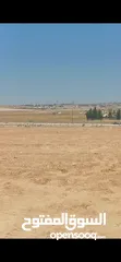 4 للبيع قطعة أرض 3.4 دونم في النقيره شارع الميه خلف كازيه جوبترول شارعين بالقرب من مشروع الشهد 4