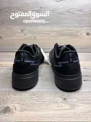  3 Adidas black shoes