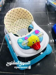  10 عرباية تعليم المشي المميزة من island toyًs مع اضاءة واصوات مختلفة والعاب مع هزاز ويد ومظلة