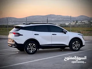  26 كايا سبورتاج /2022 فل الفل فتحة سقف  2x4 ///240Hp بنزين + كهرباء  ( Haybrid) 1600cc