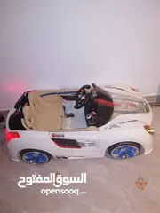  3 TOW SEATER KIDS CAR , RECHARGEABLE.