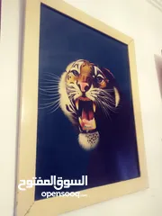  7 لوحات  رسم زيتي.. وتطريز