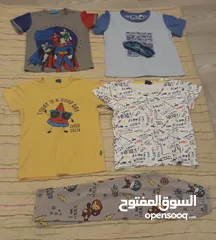  7 200  قطعة ملابس مستعملة أطفالى