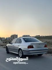  1 BMW دب موديل 99 موحل 2003 اصلي فل كامل