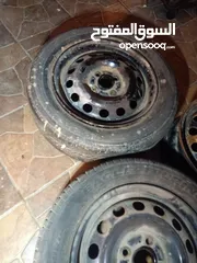  1 جنط لانسر حديد 14 برغي بعيد عدد 3