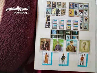  17 نيشان ملكى وزن41, 41 جرام من الدهب والفضه وعقدفضه من الاحجار الكريمه وطوابع قديمه نادره