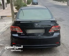  2 توبوتا كورولا 2013 سبورت 1800سي سي لون أسود بحالة الوكالة