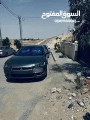  1 بسم الله الرحمن الرحيم  متسوبيشي لانسر فراشة