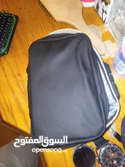  1 شنط يد رجالي صناعة امارتية